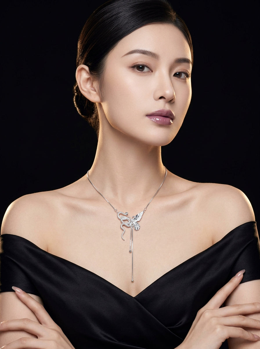 Model wearing Maison Butterfly & Serpent Pendant Necklace