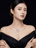 Model wearing Maison Butterfly & Serpent Pendant Necklace